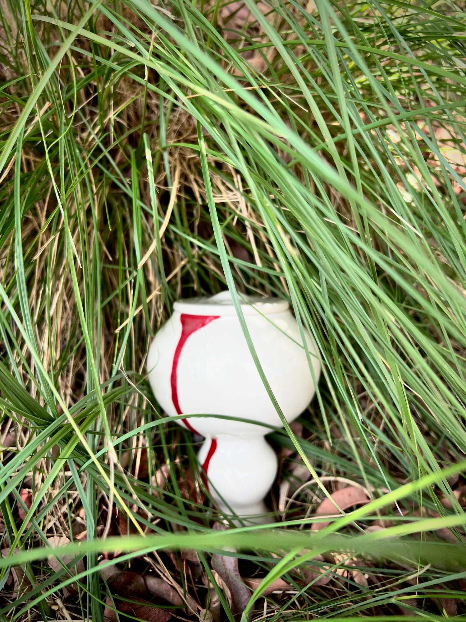 spherical vessels with red drip